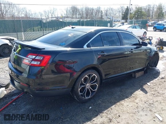 2013 Ford Taurus SHO z VIN 1FAHP2KT9DG164190, wystawiony jako IAAI lot #41743345 z przebiegiem 191 568 mil mil oraz . Historia ofert i sprzedaży dostępna na DreamBid. Obrazek 4.