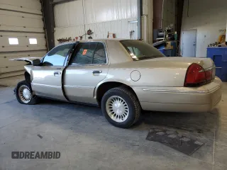 2000 Mercury Grand Marquis LS z VIN 2MEFM75W9YX660599, wystawiony jako Copart lot #52620225 z przebiegiem 88 726 mil mil oraz Szkoda całkowita • Salvage title. Historia ofert i sprzedaży dostępna na DreamBid. Obrazek 2.