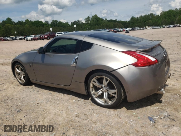 2009 Nissan 370Z Touring with VIN JN1AZ44E49M402605, listed as a Copart auction lot 55972355 with 157,066 mi miles and Clean Title. Bid and sale history available at DreamBid. Image 2.