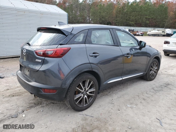 2016 Mazda CX-3 Grand Touring with VIN JM1DKBD72G0103803, listed as a Copart auction lot 82769204 with 91,727 mi miles and Salvage Title. Bid and sale history available at carsss.com. Image 3.