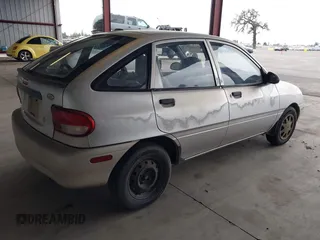 1997 Ford Aspire z VIN KNJLT06H0V6215753, wystawiony jako IAAI lot #41504661 z przebiegiem 80 300 mil mil oraz . Historia ofert i sprzedaży dostępna na DreamBid. Obrazek 4.
