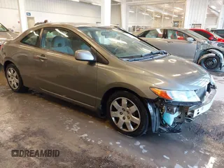 2006 Honda Civic Cpe LX with VIN 2HGFG12666H549351, listed as a IAAI auction lot 41379440 with 142,364 mi miles. Bid and sale history available at carsss.com. Image 1.
