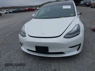 2021 Tesla Model 3 Long Range with VIN 5YJ3E1EBXMF980102, listed as a IAAI auction lot 41944364 with 48,766 mi miles and . Bid and sale history available at carsss.com. Image 12.