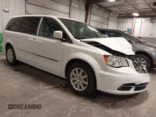 2016 Chrysler Town & Country Touring with VIN 2C4RC1BG1GR185657, listed as a IAAI auction lot 41905462 with 167,142 mi miles and . Bid and sale history available at DreamBid. Image 1.