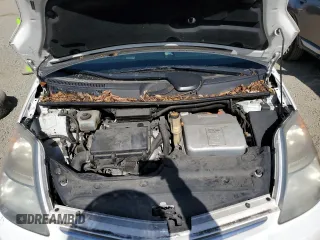 2007 Toyota Prius z VIN JTDKB20U477605335, wystawiony jako Copart lot #58747595 z przebiegiem 129 979 mil mil oraz Szkoda całkowita • Salvage title. Historia ofert i sprzedaży dostępna na DreamBid. Obrazek 11.