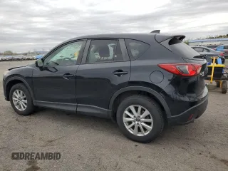 2015 Mazda CX-5 Touring with VIN JM3KE4CY3F0475757, listed as a Copart auction lot 53477875 with 104,546 mi miles and Salvage Title. Bid and sale history available at carsss.com. Image 2.