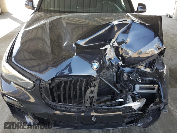2020 BMW X5 xDrive40i with VIN 5UXCR6C02L9C72472, listed as a Copart auction lot 48023145 with 59,200 mi miles and Salvage title. Bid and sale history available at DreamBid. Image 11.