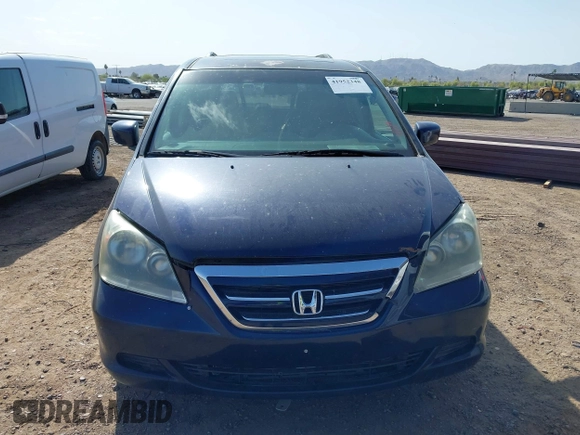 2005 Honda Odyssey EX-L with VIN 5FNRL38755B007567, listed as a IAAI auction lot 41952348 with 183,514 mi miles and . Bid and sale history available at carsss.com. Image 6.
