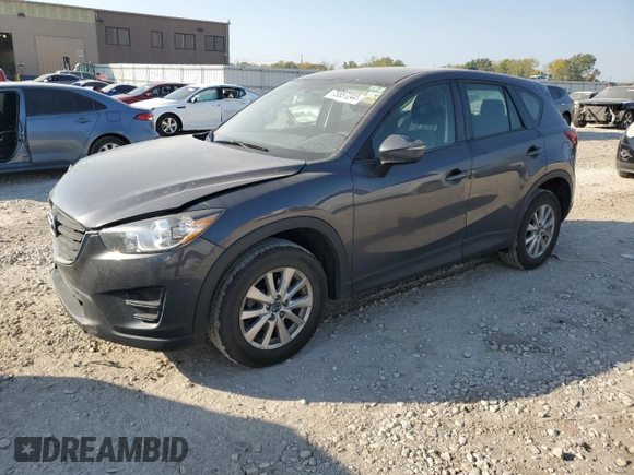 2016 Mazda CX-5 Sport with VIN JM3KE2BE7G0739544, listed as a Copart auction lot 75557244 with 128,336 mi miles and Salvage Title. Bid and sale history available at DreamBid. Image 1.