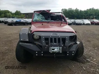 2012 Jeep Wrangler Unlimited Sport with VIN 1C4BJWDG6CL234419, listed as a Copart auction lot 62284825 with 66,649 mi miles and Salvage title. Bid and sale history available at DreamBid. Image 13.