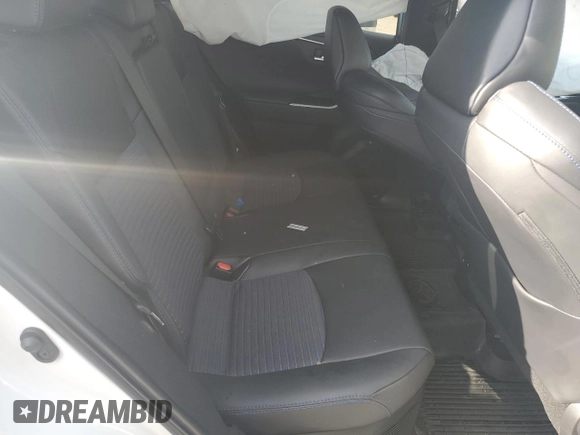 2021 Toyota RAV4 Hybrid XSE with VIN 2T3E6RFV1MW028094, listed as a Copart auction lot 52596615 with 68,497 mi miles and Salvage title. Bid and sale history available at DreamBid. Image 10.