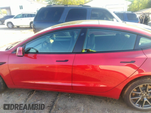 2022 Tesla Model 3 Long Range with VIN 5YJ3E1EB4NF171972, listed as a IAAI auction lot 42026031 with 40,489 mi miles and . Bid and sale history available at DreamBid. Image 13.