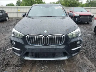 2018 BMW X1 xDrive28i z VIN WBXHT3C39J5L34133, wystawiony jako Copart lot #60195805 z przebiegiem 49 551 mil mil oraz Szkoda całkowita • Salvage title. Historia ofert i sprzedaży dostępna na DreamBid. Obrazek 5.