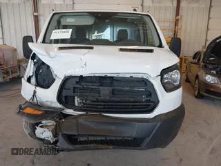 2019 Ford Transit with VIN 1FTYE1YM0KKB77849, listed as a IAAI auction lot 42175880 with 151,828 mi miles. Bid and sale history available at carsss.com. Image 6.