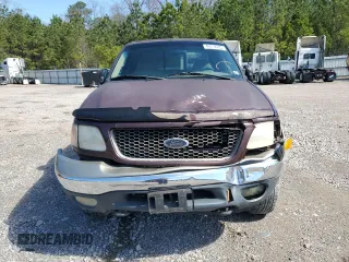 2000 Ford F-150 XL with VIN 1FTRX18L4YNA99427, listed as a Copart auction lot 49718795 with 0 mi miles and Salvage Title. Bid and sale history available at carsss.com. Image 5.