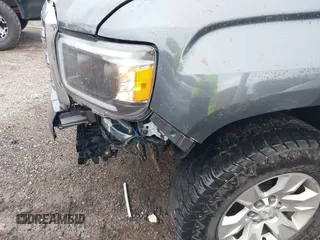 2015 GMC Canyon 4WD SLE with VIN 1GTG6BE3XF1153421, listed as a IAAI auction lot 42079375 with 161,379 mi miles and . Bid and sale history available at carsss.com. Image 6.