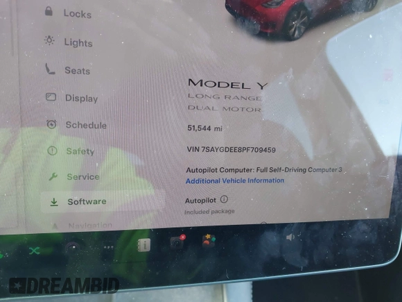 2023 Tesla Model Y Long Range with VIN 7SAYGDEE8PF709459, listed as a IAAI auction lot 41334108 with 51,544 mi miles. Bid and sale history available at carsss.com. Image 7.