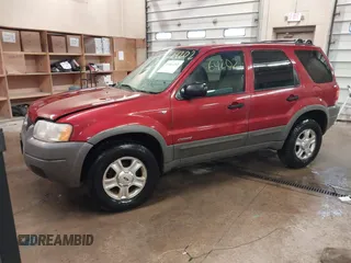 2001 Ford Escape XLT with VIN 1FMYU04101KF46809, listed as a IAAI auction lot 41664202 with 256,468 mi miles. Bid and sale history available at carsss.com. Image 17.