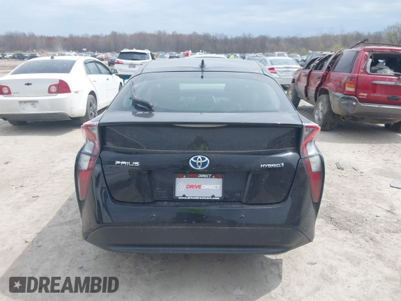 2017 Toyota Prius Two with VIN JTDKARFUXH3041931, listed as a IAAI auction lot 42075004 with 75,768 mi miles and . Bid and sale history available at DreamBid. Image 16.