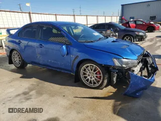 2015 Mitsubishi Lancer Evolution GSR with VIN JA32W8FV6FU006930, listed as a Copart auction lot 84628474 with 116,819 mi miles and Salvage Title. Bid and sale history available at carsss.com. Image 4.