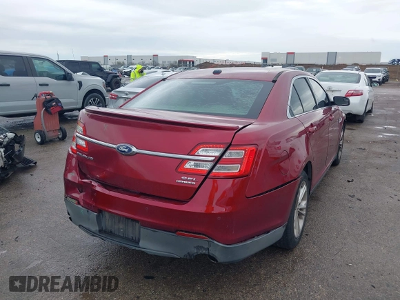 2015 Ford Taurus SEL with VIN 1FAHP2E8XFG137526, listed as a IAAI auction lot 41909658 with 147,992 mi miles and . Bid and sale history available at carsss.com. Image 4.