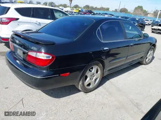 2001 Infiniti I30 Luxury with VIN JNKCA31A31T029381, listed as a IAAI auction lot 41572449 with 192,070 mi miles. Bid and sale history available at carsss.com. Image 4.