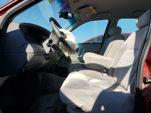 2000 Ford Crown Victoria LX with VIN 2FAFP74W2YX125453, listed as a Copart auction lot 73491924 with 235,058 mi miles and Salvage Title. Bid and sale history available at carsss.com. Image 7.