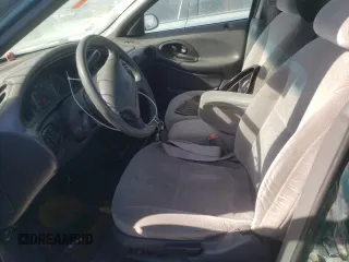 1999 Ford Taurus SE z VIN 1FAFP53U4XA114160, wystawiony jako Copart lot #74946714 z przebiegiem 106 708 mil mil oraz Szkody całkowita. Historia ofert i sprzedaży dostępna na DreamBid. Obrazek 7.