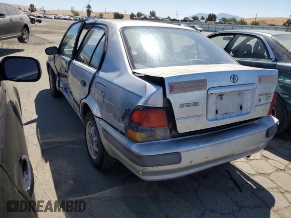1995 Toyota Tercel DX z VIN JT2EL56E7S7011335, wystawiony jako Copart lot #67978774 z przebiegiem 182 025 mil mil oraz Szkoda całkowita • Salvage title. Historia ofert i sprzedaży dostępna na DreamBid. Obrazek 2.