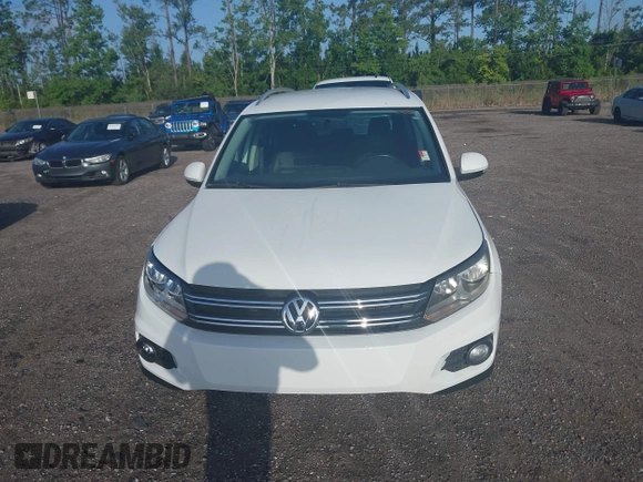 2014 Volkswagen Tiguan SE с VIN WVGAV3AX0EW598528, выставлен на аукционе IAAI как лот 42453851 с пробегом 141 869 миль миль и . История ставок и продаж доступна на DreamBid. Изображение 12.