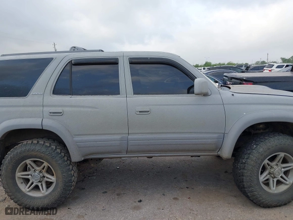 1998 Toyota 4Runner Limited with VIN JT3HN87R7W0184602, listed as a IAAI auction lot 41942100 with 272,823 mi miles. Bid and sale history available at carsss.com. Image 12.