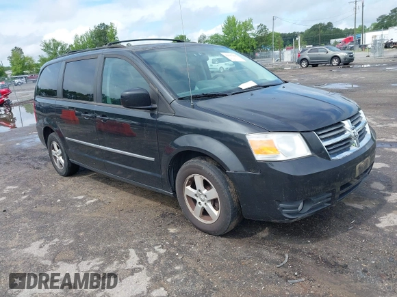 2010 Dodge Grand Caravan SXT with VIN 2D4RN5D11AR459864, listed as a IAAI auction lot 42197818 with 149,553 mi miles and . Bid and sale history available at DreamBid. Image 1.