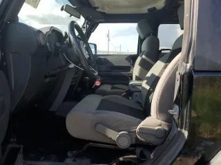 2010 Jeep Wrangler Rubicon with VIN 1J4BA6D10AL109001, listed as a Copart auction lot 69453954 with 137,821 mi miles and Salvage title. Bid and sale history available at DreamBid. Image 7.
