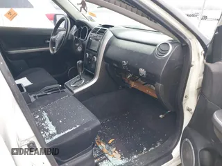 2006 Suzuki Grand Vitara z VIN JS3TE941064100737, wystawiony jako IAAI lot #41598940 z przebiegiem Nie podano mil oraz . Historia ofert i sprzedaży dostępna na DreamBid. Obrazek 5.