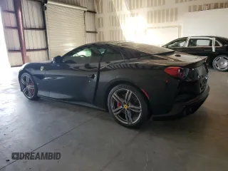 2019 Ferrari Portofino z VIN ZFF89FPA2K0239970, wystawiony jako Copart lot #74377964 z przebiegiem 6575 mil mil oraz Szkody całkowita. Historia ofert i sprzedaży dostępna na DreamBid. Obrazek 2.