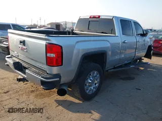 2017 GMC Sierra 2500HD Denali with VIN 1GT12UEY2HF192132, listed as a IAAI auction lot 42094570 with 119,361 mi miles and . Bid and sale history available at DreamBid. Image 4.