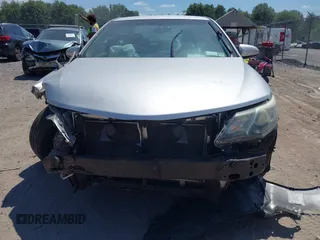 2014 Toyota Camry L with VIN 4T1BF1FK1EU414194, listed as a IAAI auction lot 42807873 with 108,994 mi miles and . Bid and sale history available at DreamBid. Image 13.