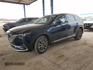 2021 Mazda CX-9 Carbon Edition z VIN JM3TCADY3M0513086, wystawiony jako Copart lot #53734925 z przebiegiem 92 744 mil mil oraz Szkoda całkowita • Salvage title. Historia ofert i sprzedaży dostępna na DreamBid. Obrazek 1.
