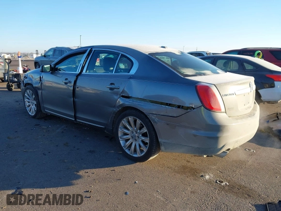 2012 Lincoln MKS with VIN 1LNHL9ER0CG801671, listed as a IAAI auction lot 41287565 with 137,903 mi miles. Bid and sale history available at carsss.com. Image 3.