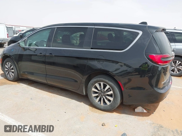 2023 Chrysler Pacifica Hybrid Touring L с VIN 2C4RC1L78PR551371, выставлен на аукционе IAAI как лот 42235410 с пробегом 49 519 миль миль и . История ставок и продаж доступна на DreamBid. Изображение 14.