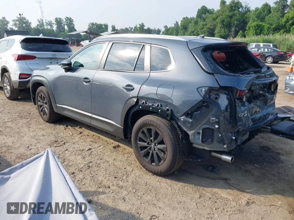 2024 Mazda CX-50 S Premium z VIN 7MMVABDM7RN231991, wystawiony jako IAAI lot #42481427 z przebiegiem 7 843 mil mil oraz . Historia ofert i sprzedaży dostępna na DreamBid. Obrazek 3.