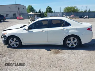 2009 Acura TSX with VIN JH4CU26619C010409, listed as a IAAI auction lot 39634371 with 76,758 mi miles. Bid and sale history available at carsss.com. Image 15.
