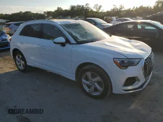 2019 Audi Q3 Premium with VIN WA1AECF38K1076355, listed as a Copart auction lot 74242994 with 86,594 mi miles and Salvage Title. Bid and sale history available at carsss.com. Image 4.