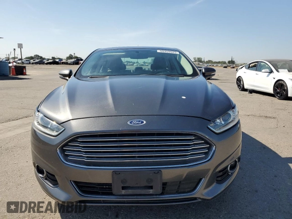 2016 Ford Fusion Titanium with VIN 3FA6P0K98GR144946, listed as a Copart auction lot 60359525 with 51,499 mi miles and Salvage title. Bid and sale history available at DreamBid. Image 5.