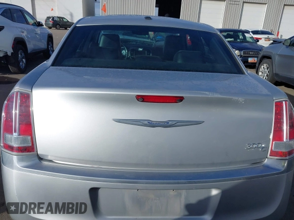 2012 Chrysler 300 C Luxury Series with VIN 2C3CCAPT9CH229047, listed as a IAAI auction lot 41219651 with 79,184 mi miles and . Bid and sale history available at carsss.com. Image 16.