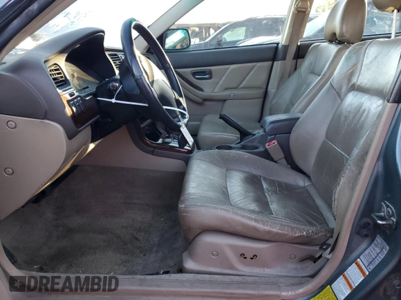 2002 Subaru Legacy Outback Limited with VIN 4S3BH686527652037, listed as a Copart auction lot 83311474 with 212,548 mi miles and Salvage title. Bid and sale history available at DreamBid. Image 7.