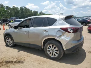 2014 Mazda CX-5 Sport with VIN JM3KE2BE2E0349755, listed as a Copart auction lot 58212375 with Not provided miles and Clean title. Bid and sale history available at DreamBid. Image 2.