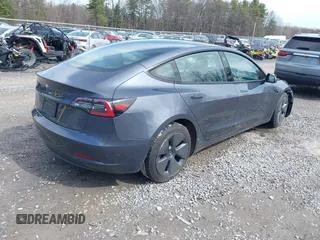 2023 Tesla Model 3 z VIN 5YJ3E1EA5PF451085, wystawiony jako IAAI lot #41941655 z przebiegiem 56 532 mil mil oraz . Historia ofert i sprzedaży dostępna na DreamBid. Obrazek 4.