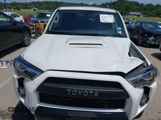 2018 Toyota 4Runner SR5 with VIN JTEBU5JRXJ5595186, listed as a IAAI auction lot 42607713 with 83,592 mi miles and . Bid and sale history available at DreamBid. Image 6.