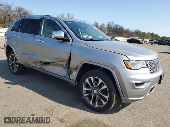 2018 Jeep Grand Cherokee Overland z VIN 1C4RJFCM3JC401399, wystawiony jako Copart lot #53167035 z przebiegiem 87 886 mil mil oraz Nie do naprawy • Non repairable. Historia ofert i sprzedaży dostępna na DreamBid. Obrazek 4.